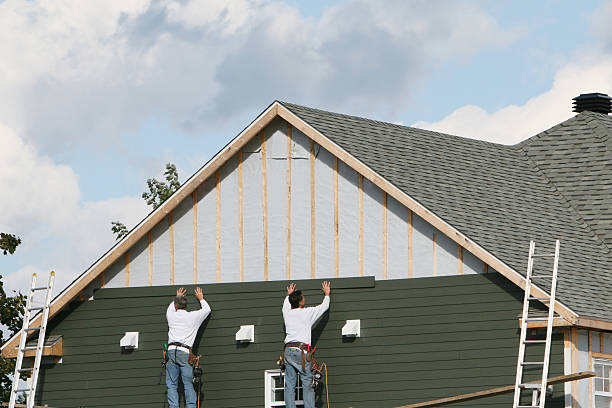 Professional Siding Installation technician working in New Concord, OH